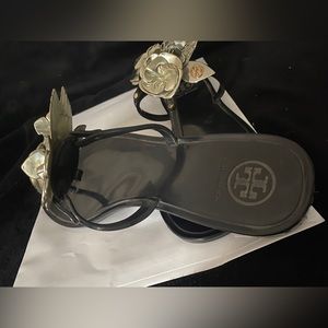 Tory Burch blossom flat jelly thong sandal.